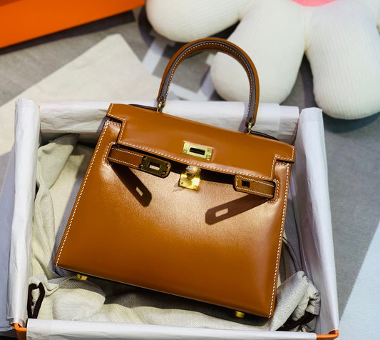 СУМКА KELLY MINI 20 З ГЛАДКОЇ ТЕЛЯЧОЇ ШКІРИ КОЛЬОРУ БРОНЗОВО-КОРИЧНЕВИЙ ІЗ ЗОЛОТОЮ ФУРНІТУРОЮ