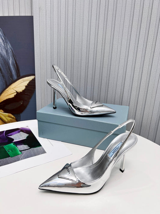 PRADA 26S SLINGBACK PUMPS STILETTO HEEL 95MM IN SILVER PATENT CALFSKIN LOGO