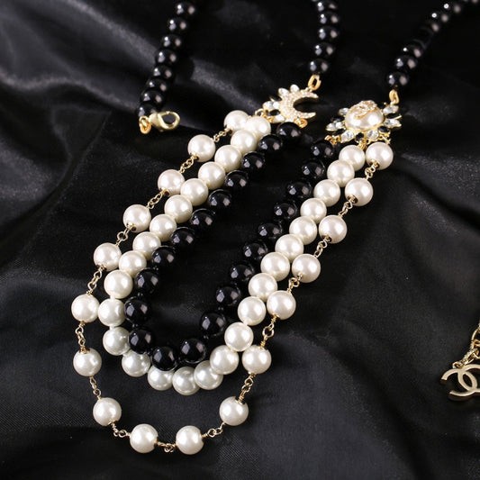 CHANEL 25S CHAIN BELT IN WHITE AND BLACK PEARL 614477 - 30
