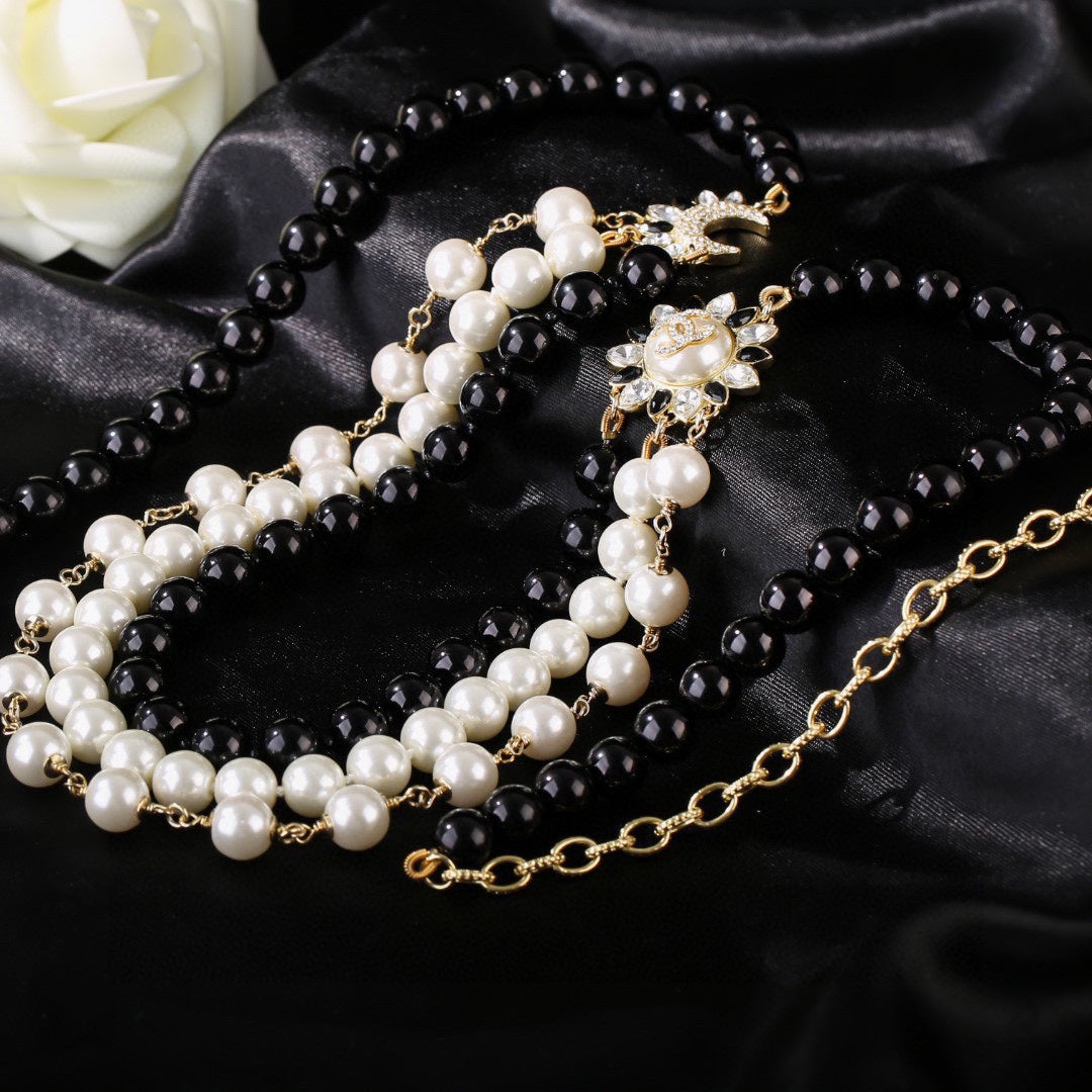CHANEL 25S CHAIN BELT IN WHITE AND BLACK PEARL 614477 - 30