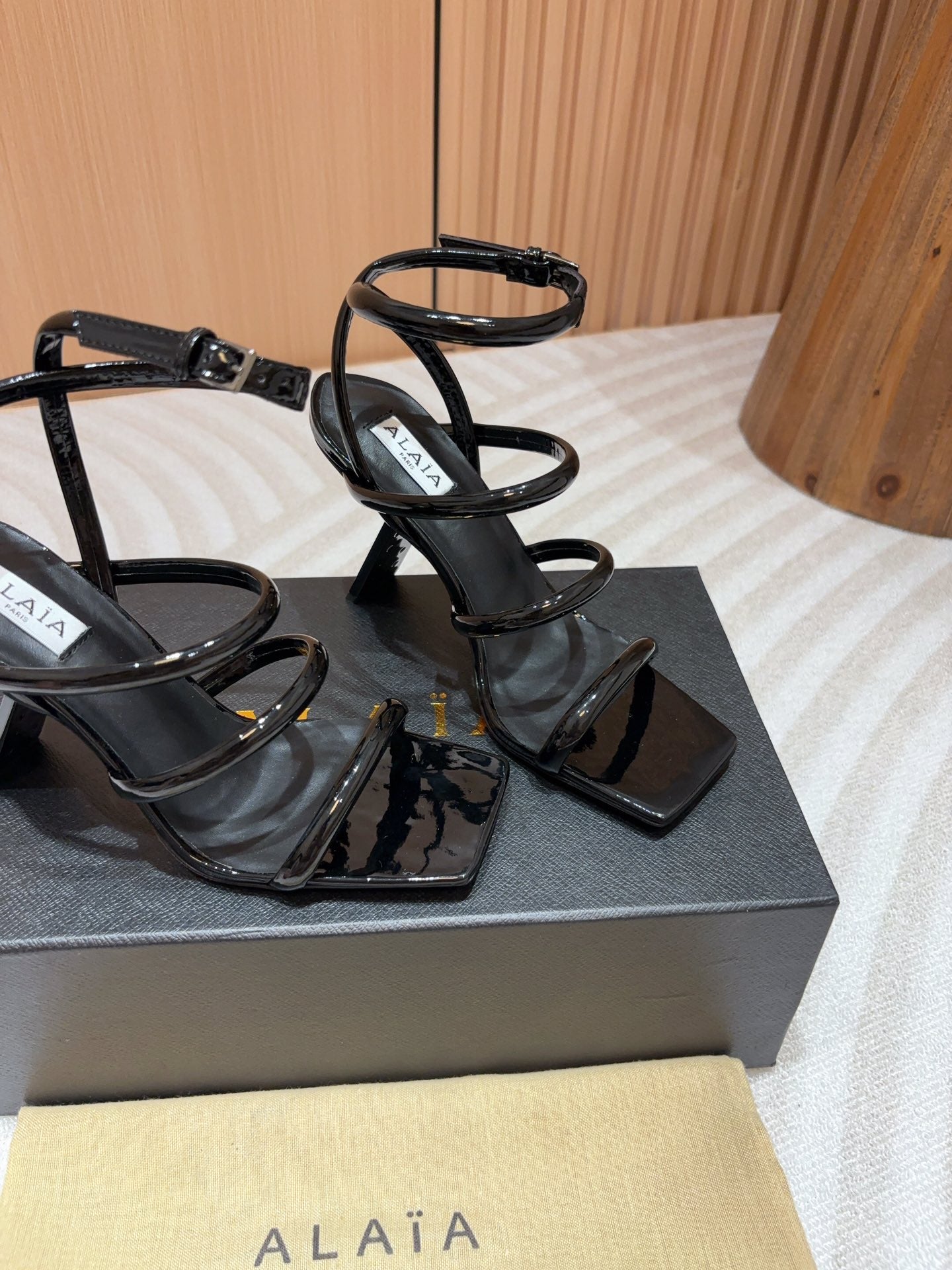 ALAIA THREE-STRAPS HIGH HEEL SANDALS IN BLACK PATENT LAMBSKIN - 35