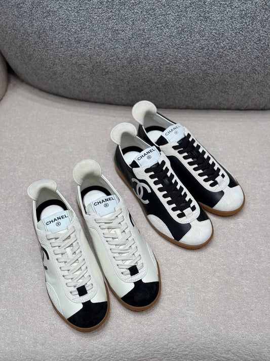 Chanel Black & White Leather Low-Top Sneakers with Oversized CC Logo