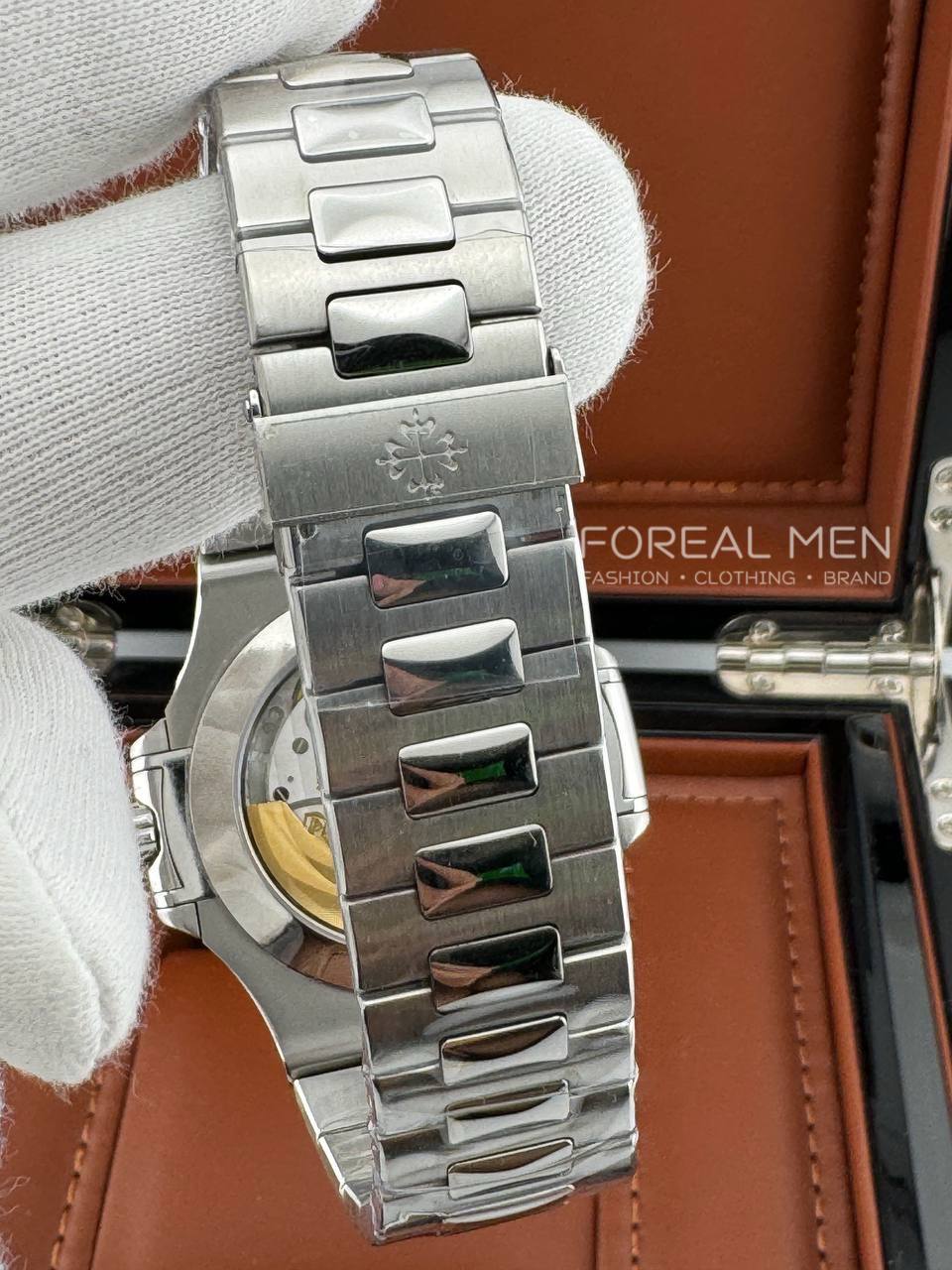 Patek Philippe Nautilus Stainless Steel Watch with White Dial & Annual Calendar