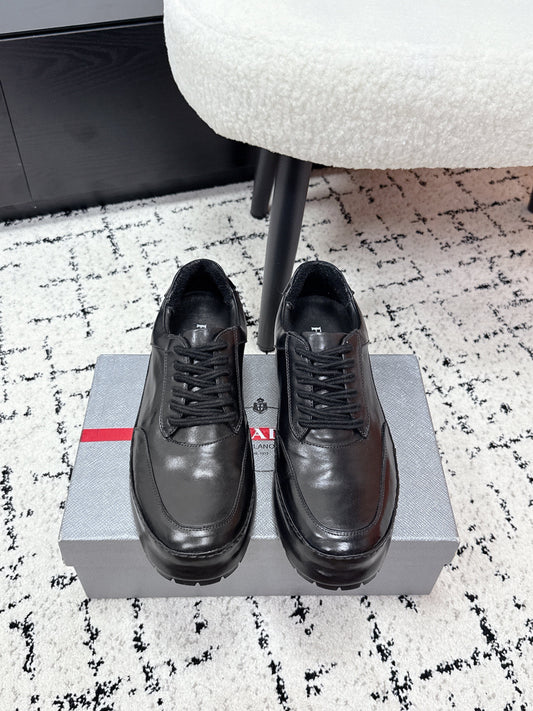PRADA 26S SNEAKERS IN BLACK SHINY CALFSKIN
