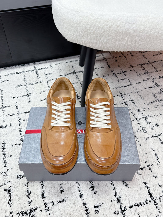 PRADA 26S SNEAKERS IN GOLDEN BROWN SHINY CALFSKIN