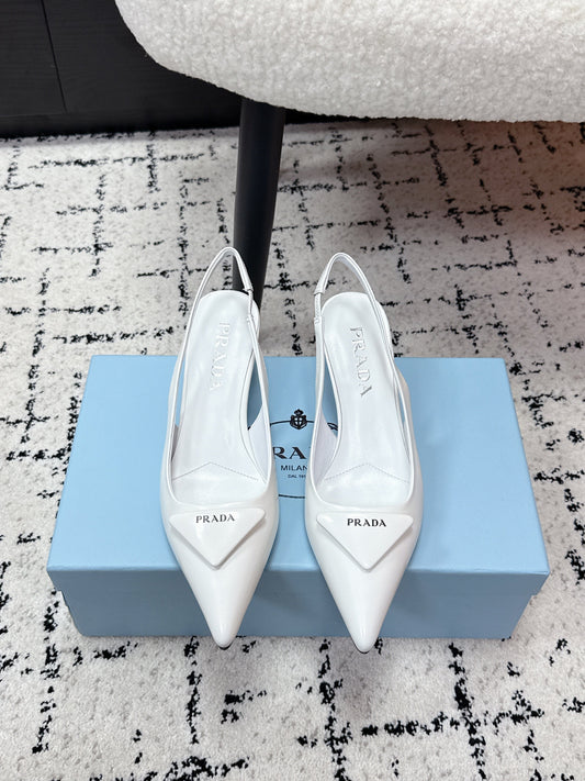 PRADA 26S SLINGBACK PUMPS 60MM IN WHITE PATENT CALFSKIN