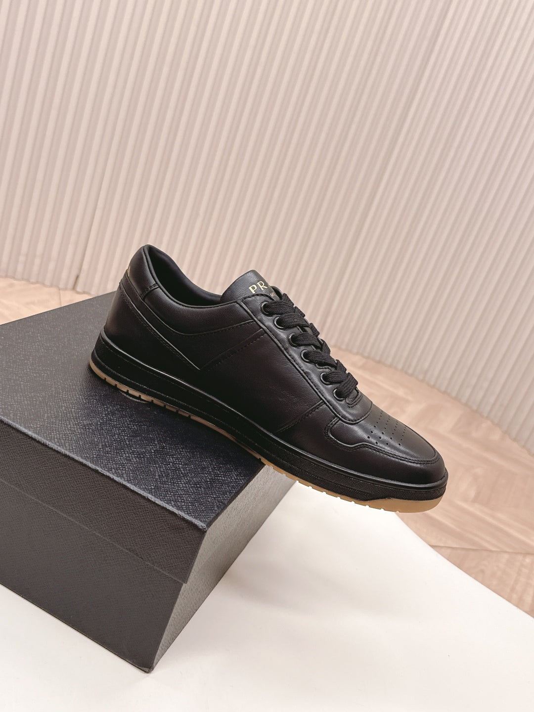 PRADA 25S DOWNTOWN SNEAKERS IN BLACK CALFSKIN - 35