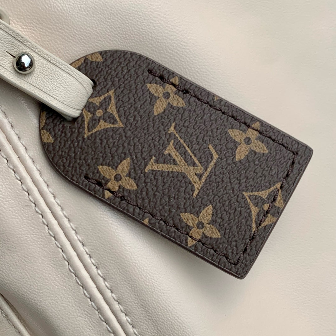 CARRYALL CARGO VIBE PM 33.5 IN VANILLE LAMBSKIN BORWN MONOGRAM TAG