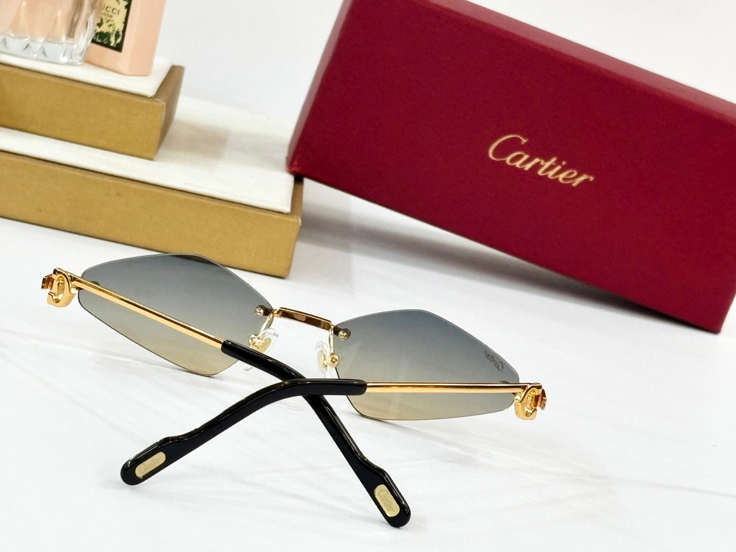 C DE RIMLESS ANGULAR FRAME SUNGLASSES CT0695 IN METAL - Light purple