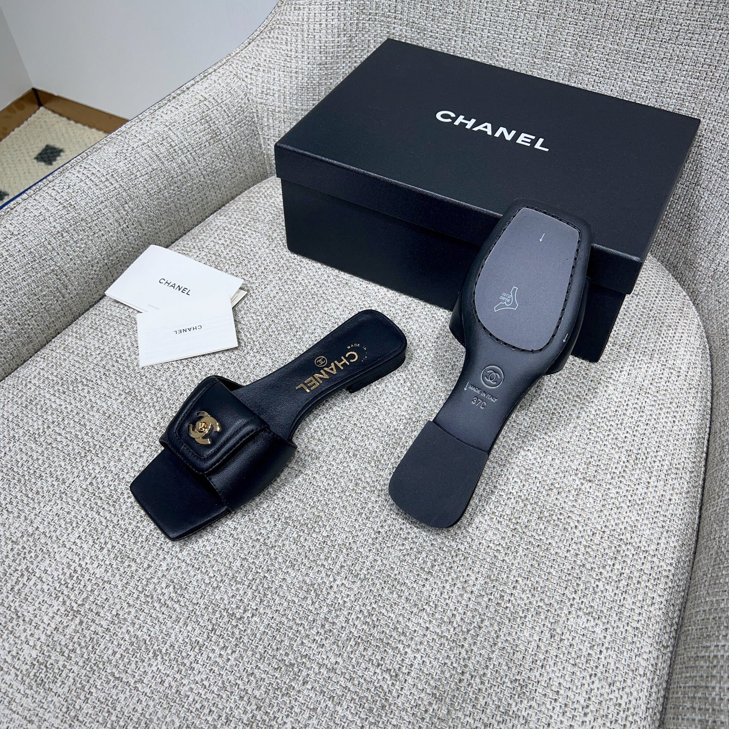 CHANEL 26S FLAT SLIDES IN BLACK LAMBSKIN