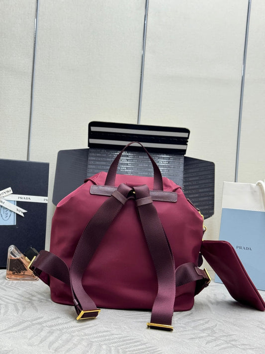 PRADA 25S RE-EDITION 1978 SMALL BACKPACK 32 IN BURGUNDY RE-NYLON