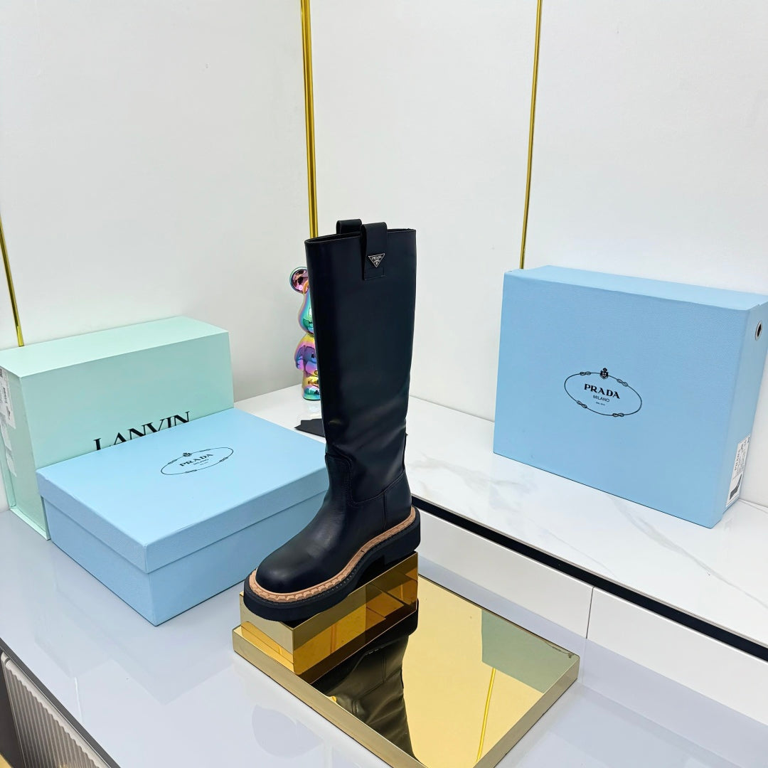 PRADA 25S TALL CHELSEA BOOTS 50MM IN BLACK CALFSKIN - 35