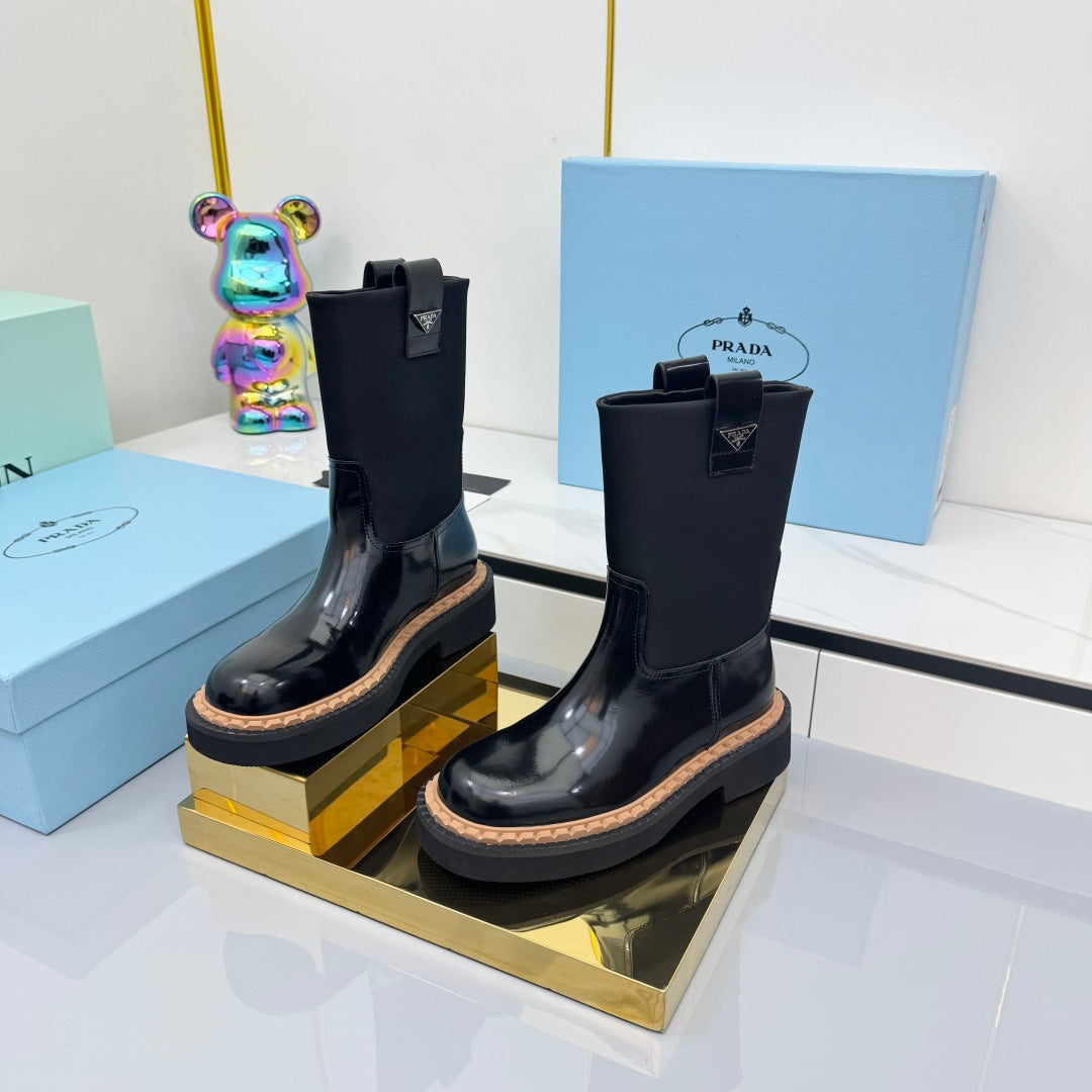 PRADA 25S HIGH MARTIN BOOTS 50MM IN BLACK GLOSSY CALFSKIN - 35
