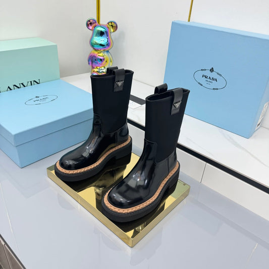 PRADA 25S HIGH MARTIN BOOTS 50MM IN BLACK GLOSSY CALFSKIN - 35