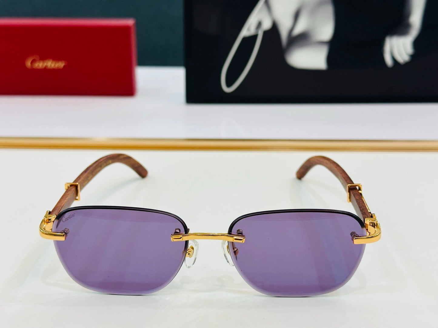 C DE RIMLESS SQUARE FRAME SUNGLASSES CT0605S IN METAL AND WOODEN - Light purple