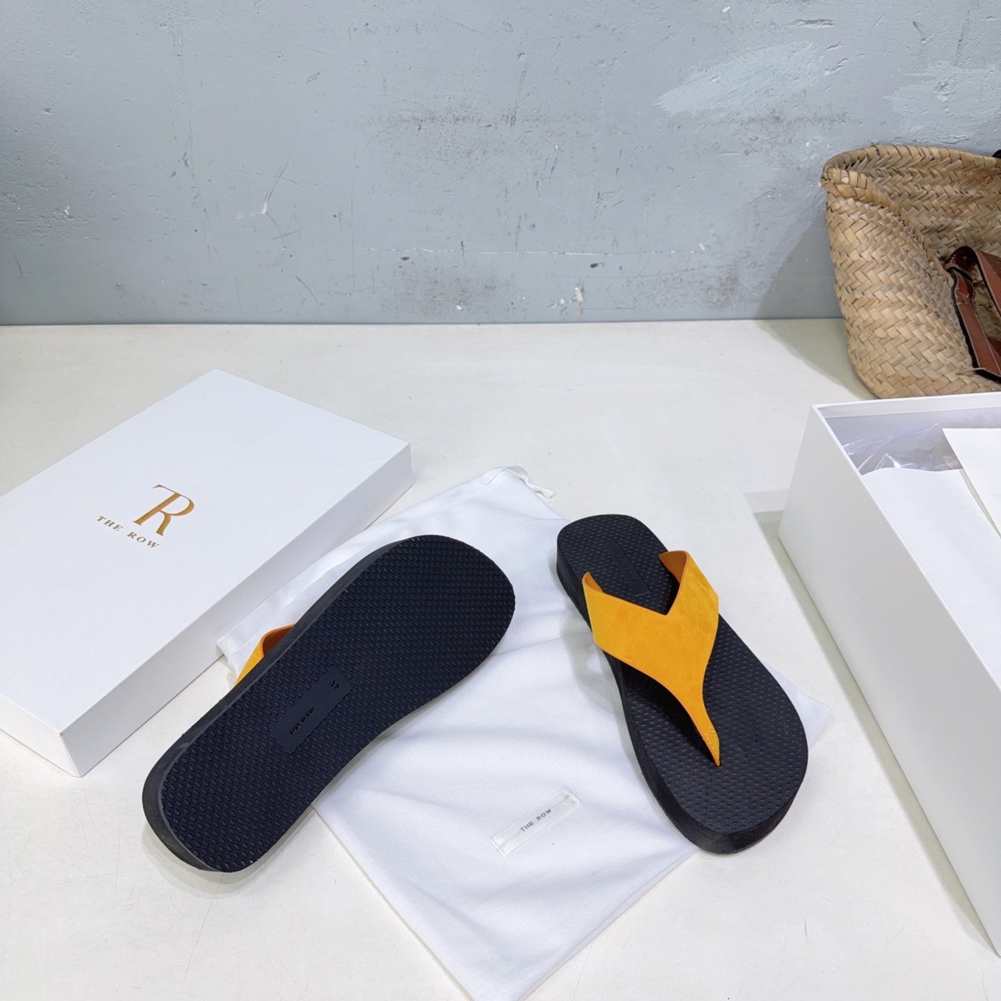 THE ROW 26S THONG SANDALS IN BLACK RUBBER WITH GOLD YELLOW STRAPS