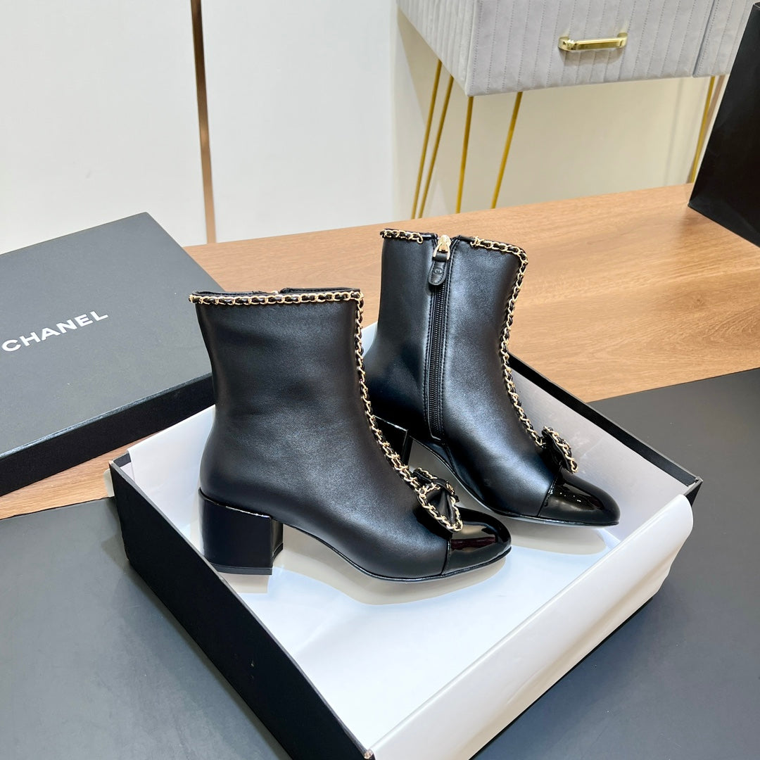 CHANEL 25S HEELED CHAIN BOOTS WITH BOW IN BLACK CALFSKIN GOLD HARDWRE - 35