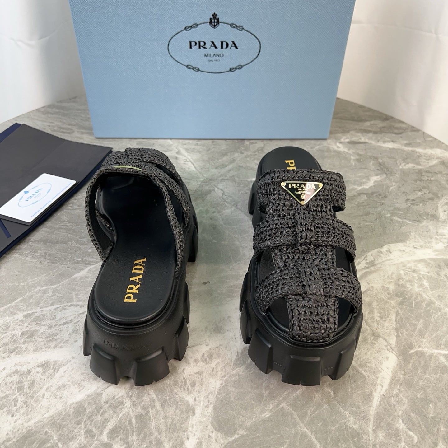 PRADA 25S MONOLITH RUBBER MULES IN BLACK RAFFIA AND LAMBSKIN - 35