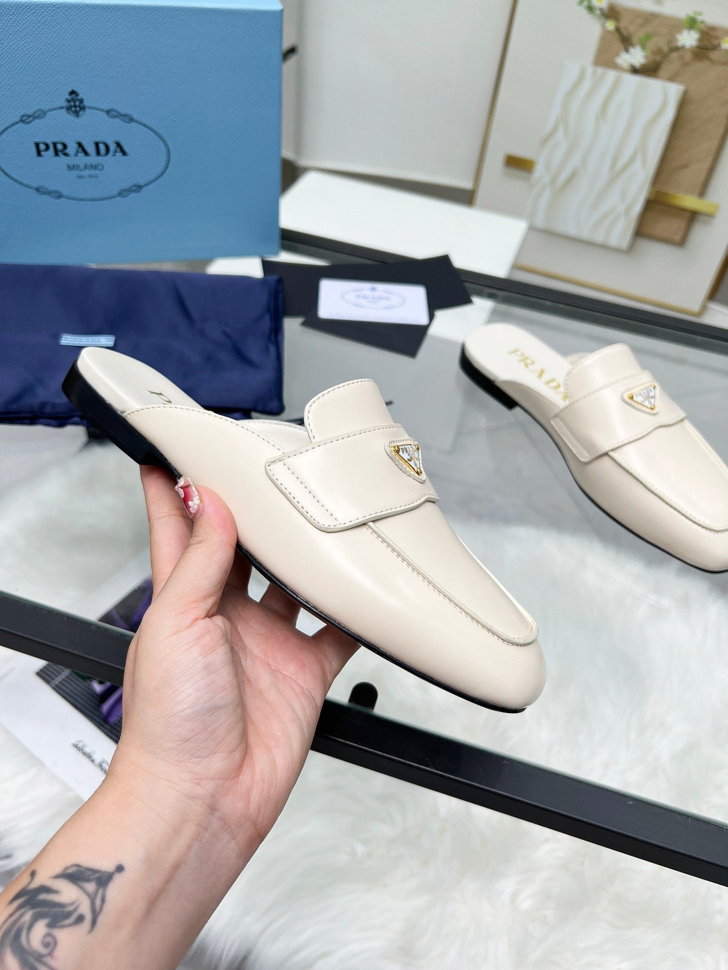 TRIANGLE LOGO MULES IN WHITE CALFSKIN - 35