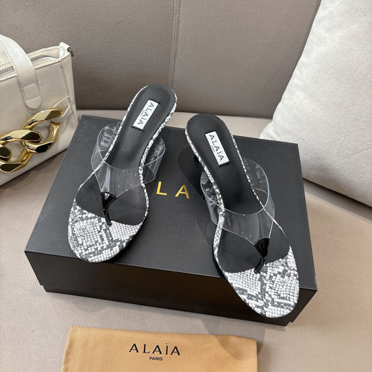 ALAIA HEELED THONG 25S 55 MM IN WHITE AND BLACK LAMBSKIN SNAKE-EMBOSSED WITH CLEAR STRAP - 35