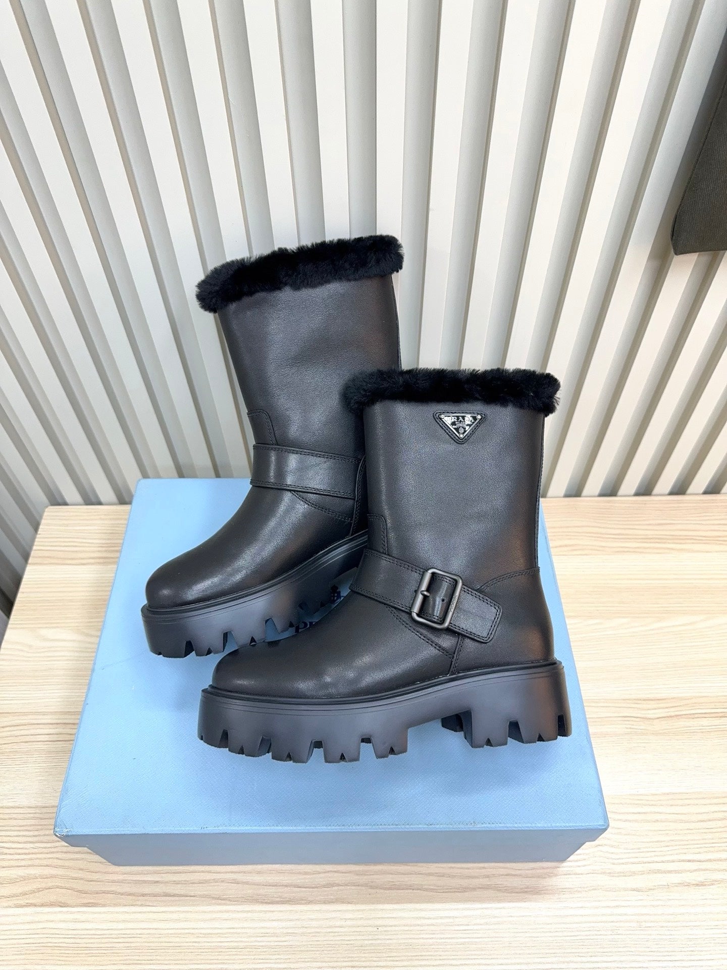 PRADA 25S MARTIN BOOTS IN BLACK CALFSKIN FUR-LINED - 35
