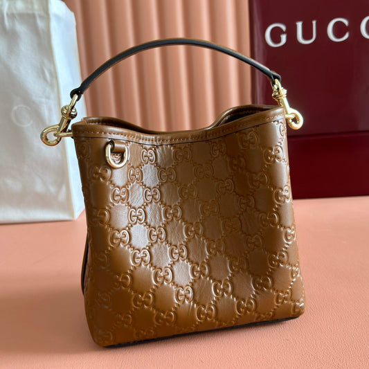 Сумка GUCCI 26S HAND BAG 19 зі шкіри теляти коричневого кольору з монограмним візерунком