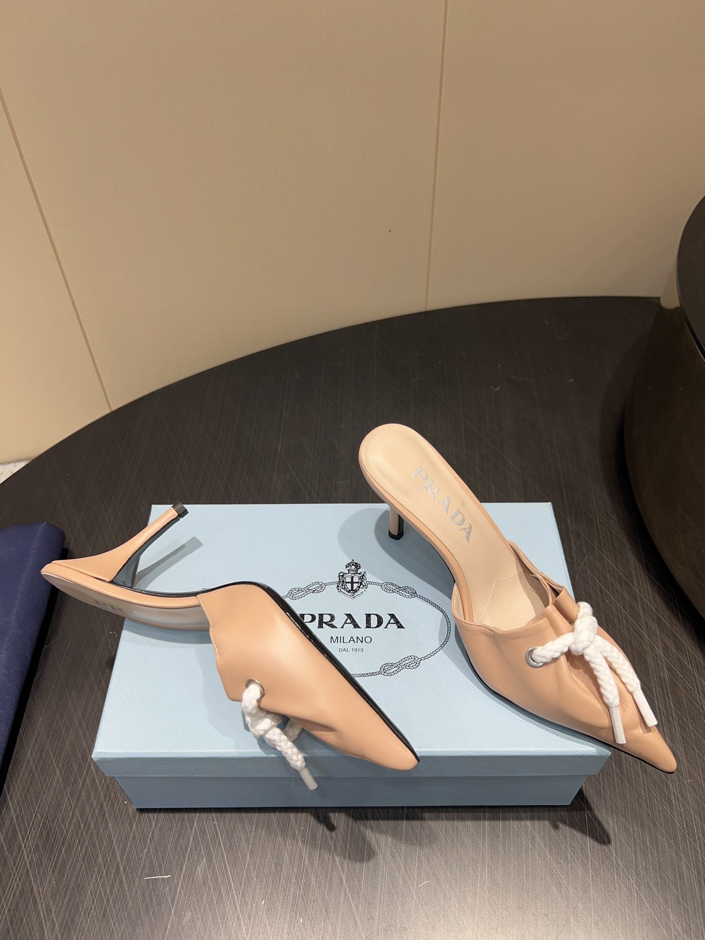 PRADA 25S BRAIDED DETAIL MULES 85MM IN BEIGE CALFSKIN - 35