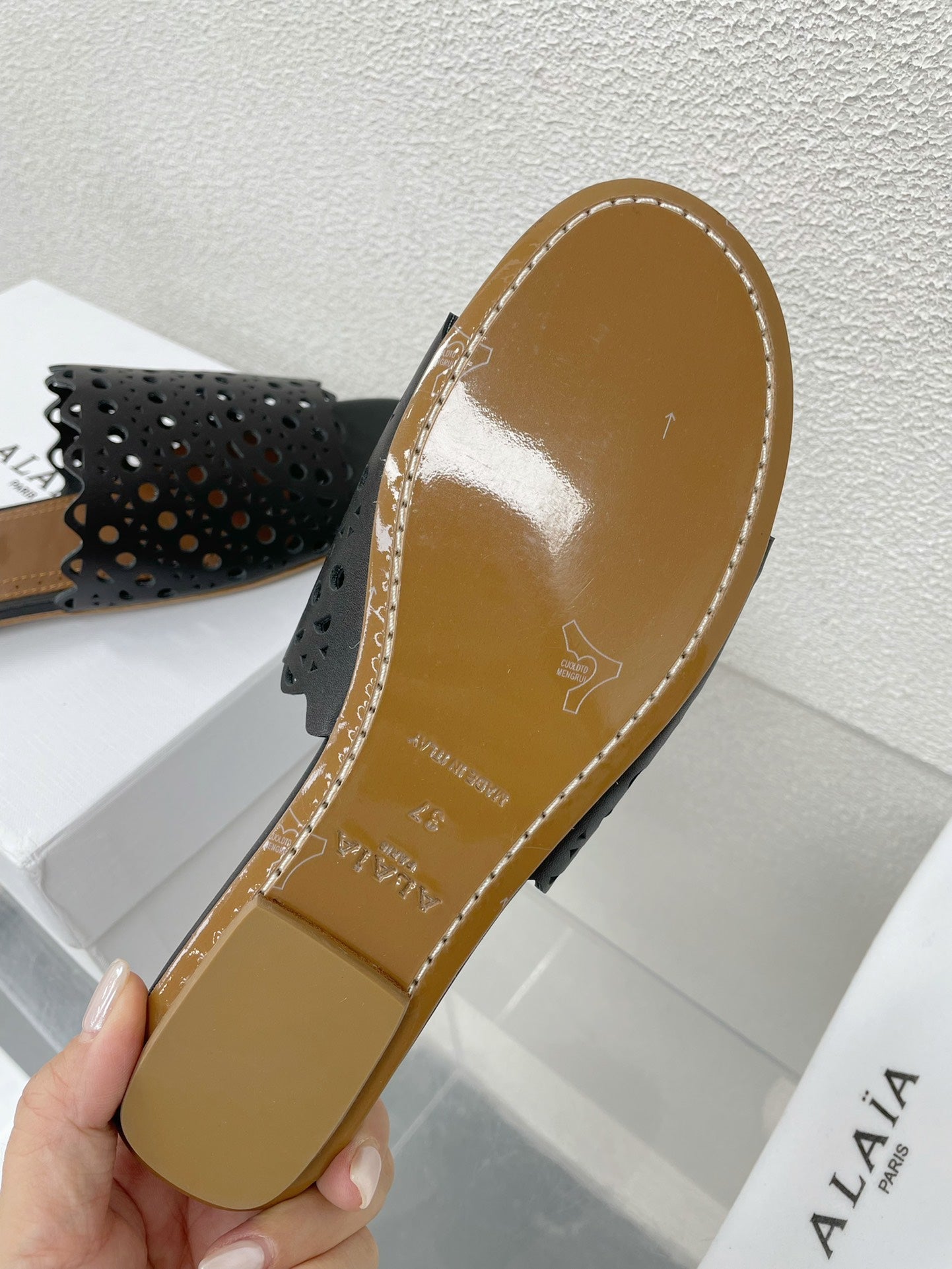 ALAIA VIENNE FLAT MULES IN BLACK LAMBSKIN - 34