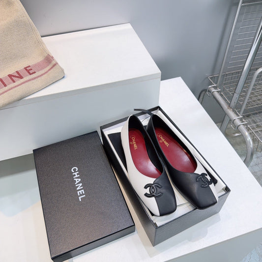 CHANEL 26S SQUARE-TOE FLATS IN BLACK AND WHITE LAMBSKIN