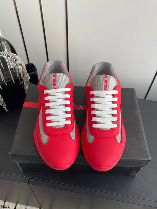 PRADA 26S AMERICA CUP SNEAKERS IN RED SOFT RUBBER AND BIKE FABRIC