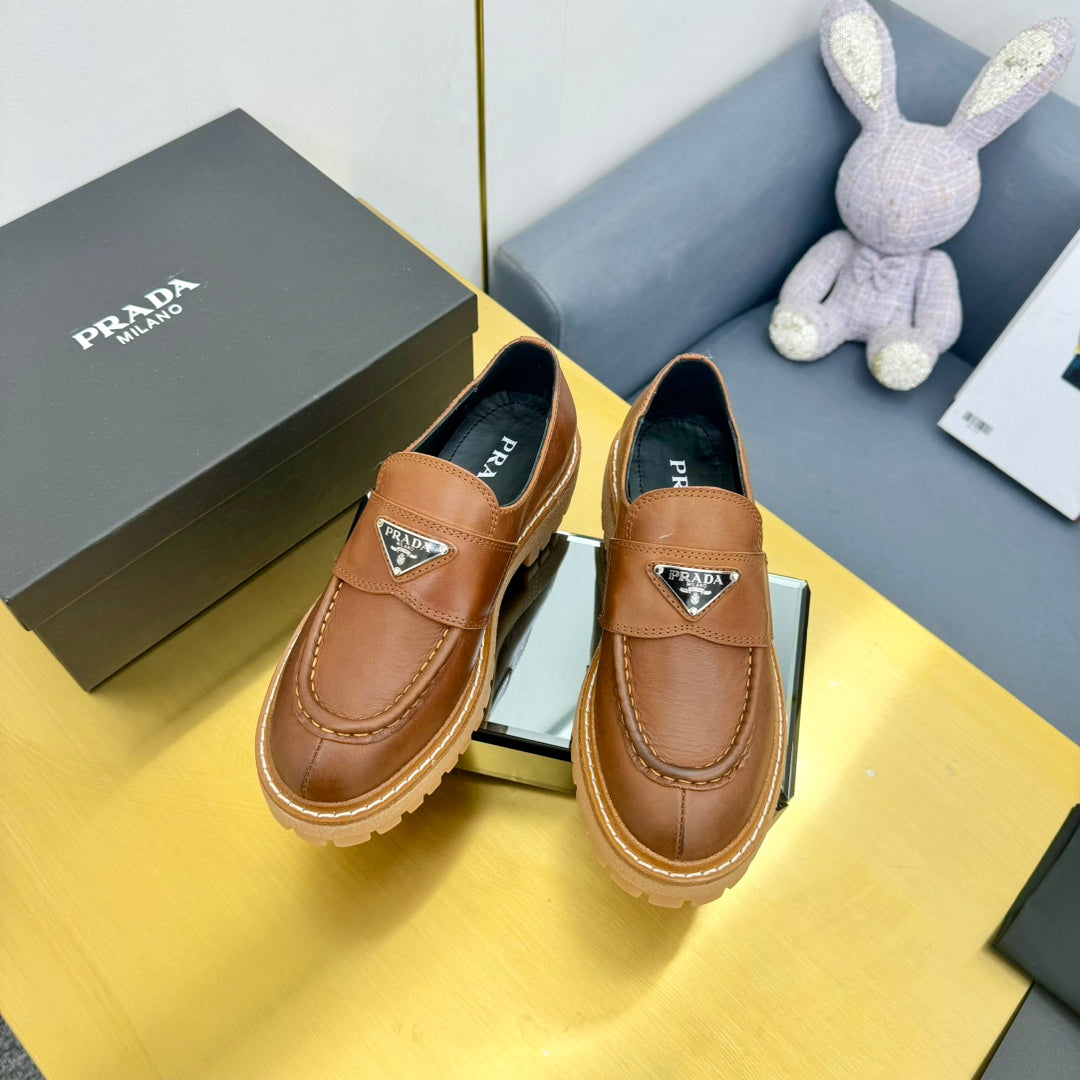 LOAFER WITH TRIANGLE LOGO IN COGNAC CALFSKIN - 35