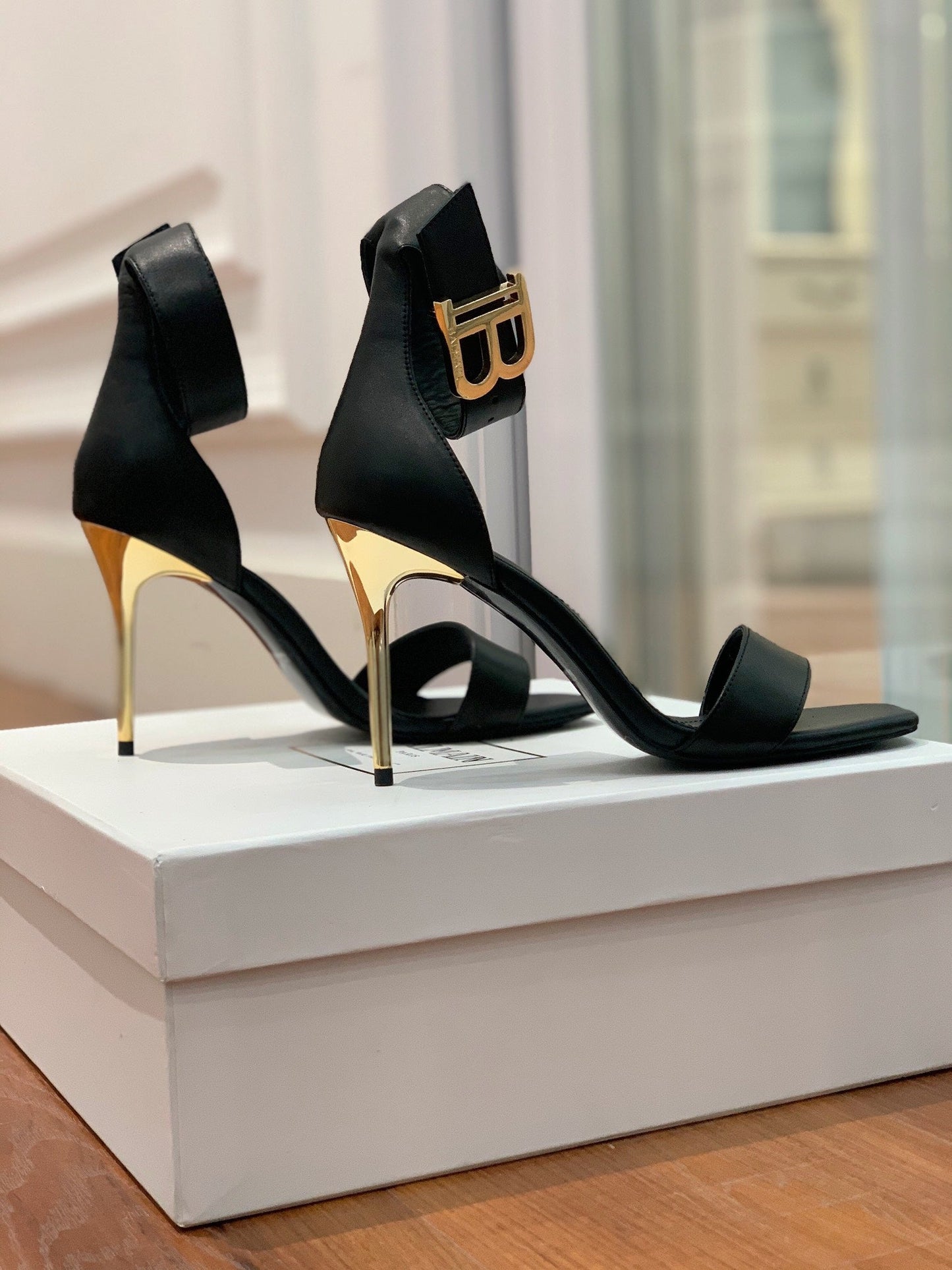 BALMAIN 25S THIN STRAP HIGH HEELS 105MM IN BLACK CALFSKIN GOLD HARDWARE - 35