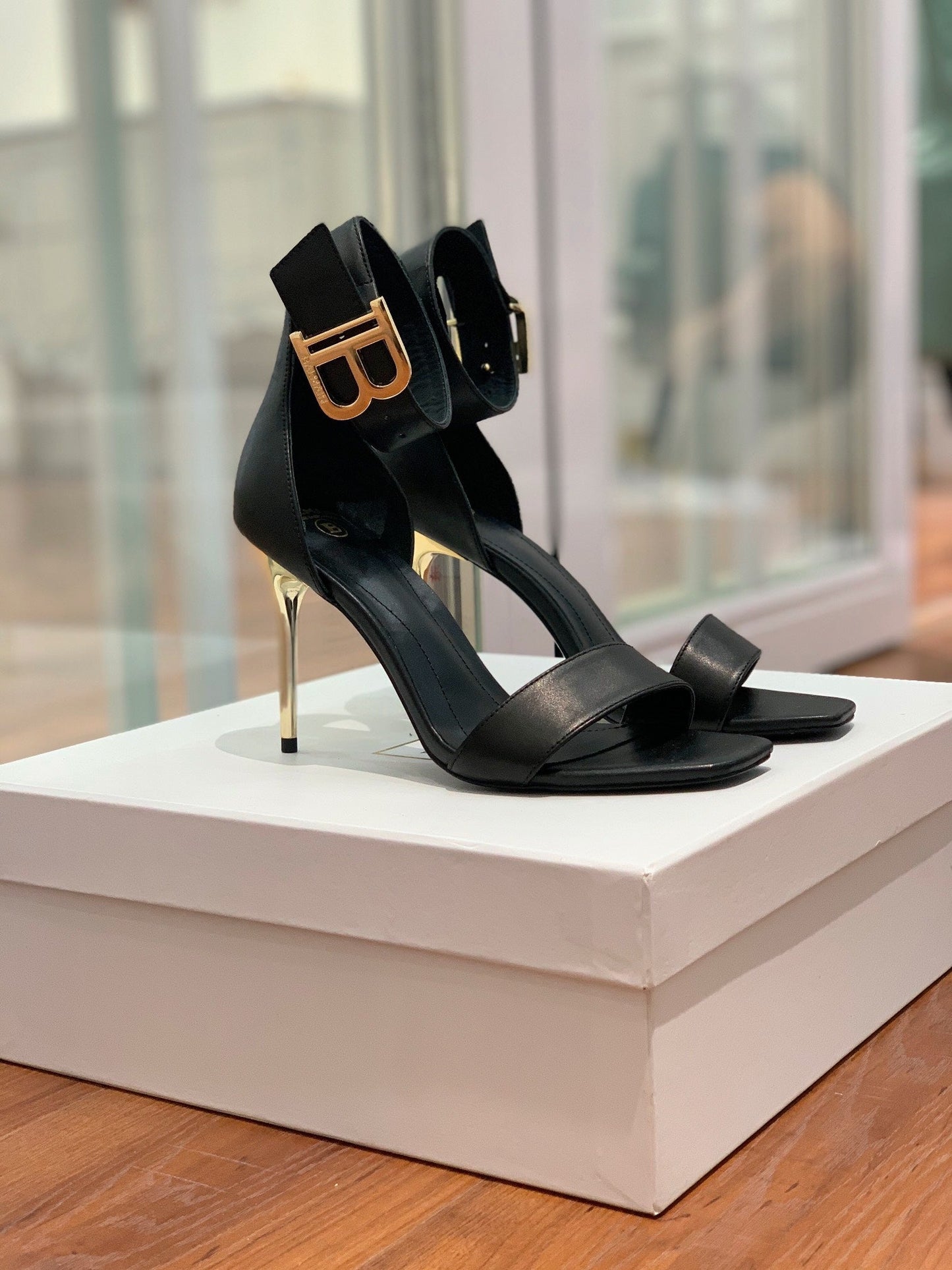 BALMAIN 25S THIN STRAP HIGH HEELS 105MM IN BLACK CALFSKIN GOLD HARDWARE - 35