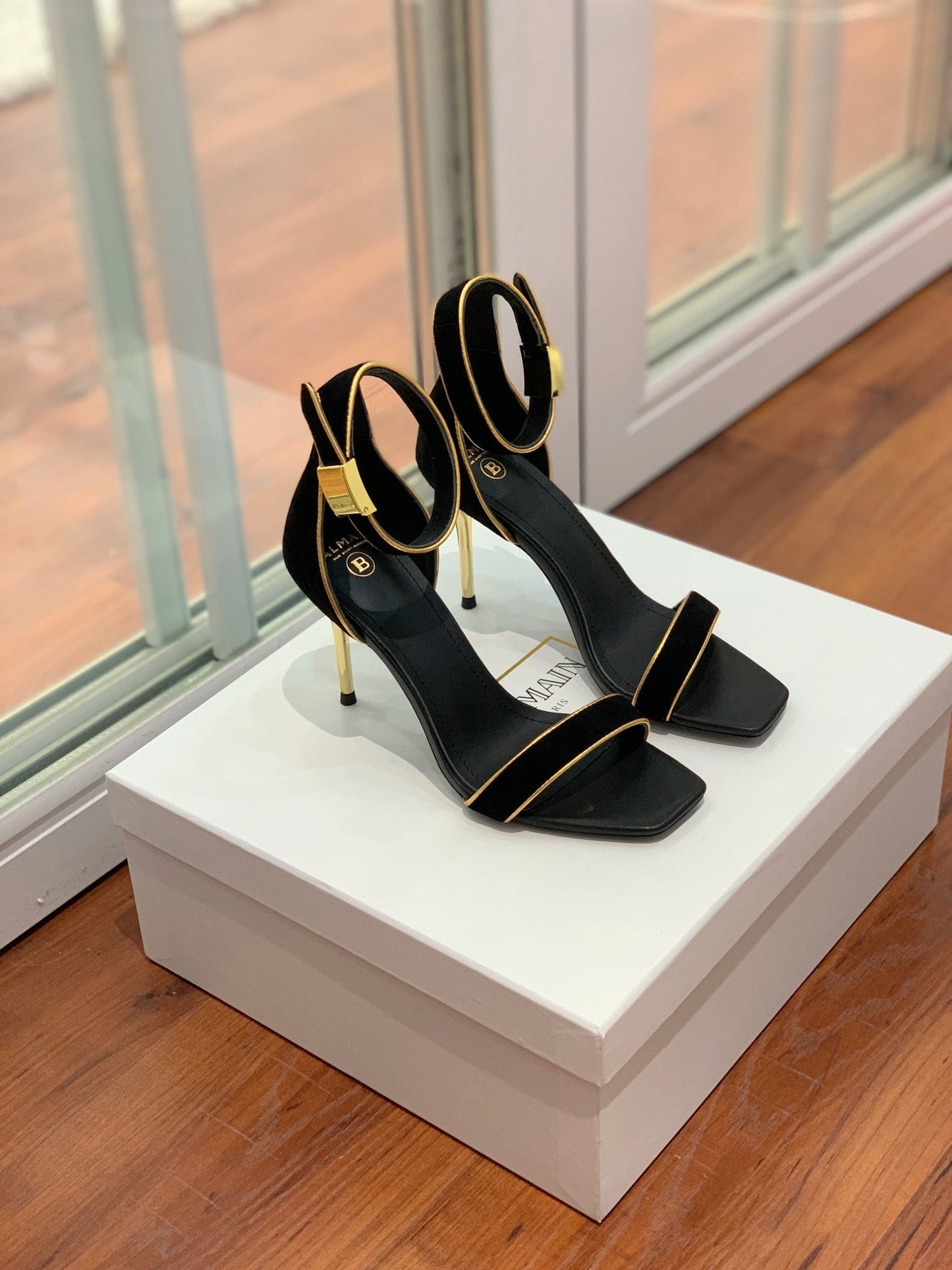 BALMAIN 25S UMA HEELED SANDALS 105MM IN BLACK SUEDE GOLD HARDWARE - 35