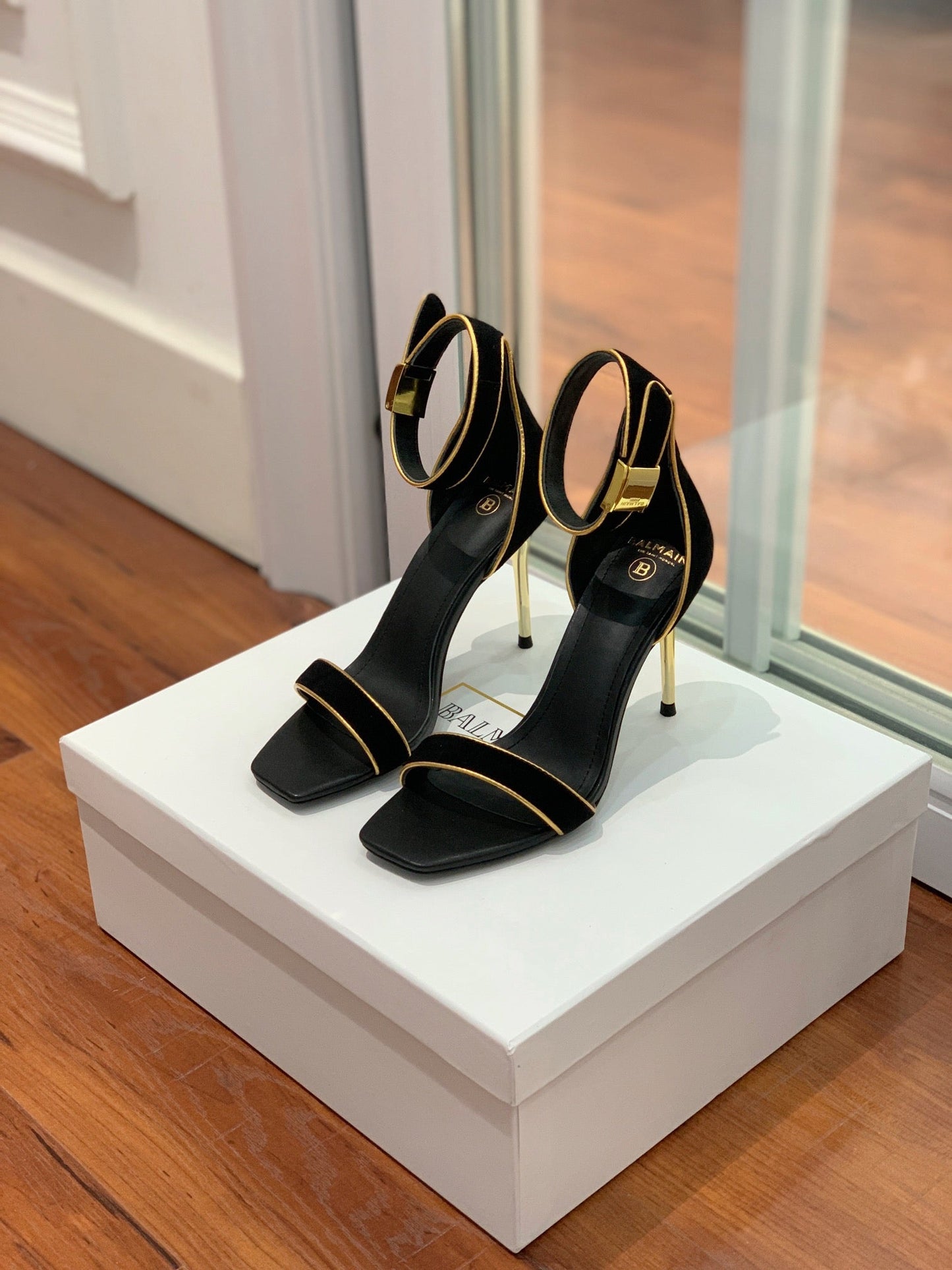 BALMAIN 25S UMA HEELED SANDALS 105MM IN BLACK SUEDE GOLD HARDWARE - 35