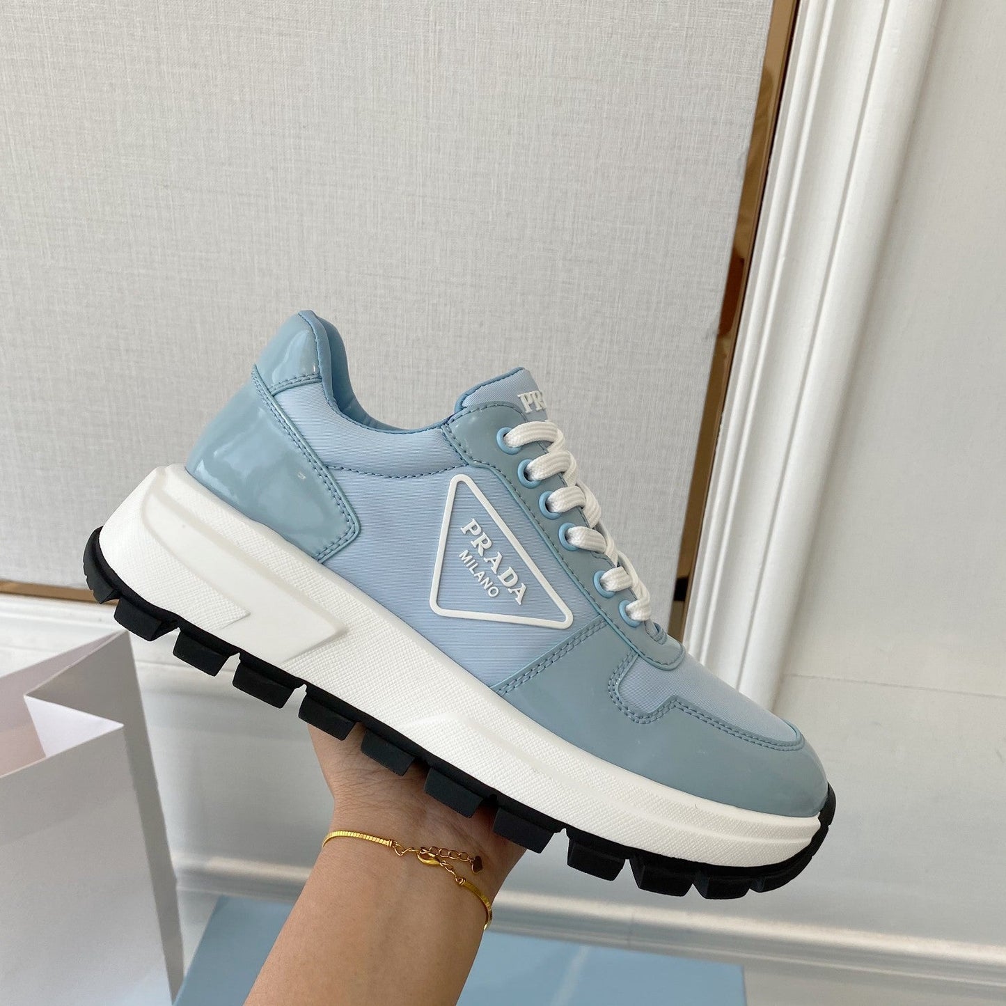 PRADA 25S THICK SOLE SNEAKER IN LIGHT BLUE CALFSKIN AND CANVAS - 34