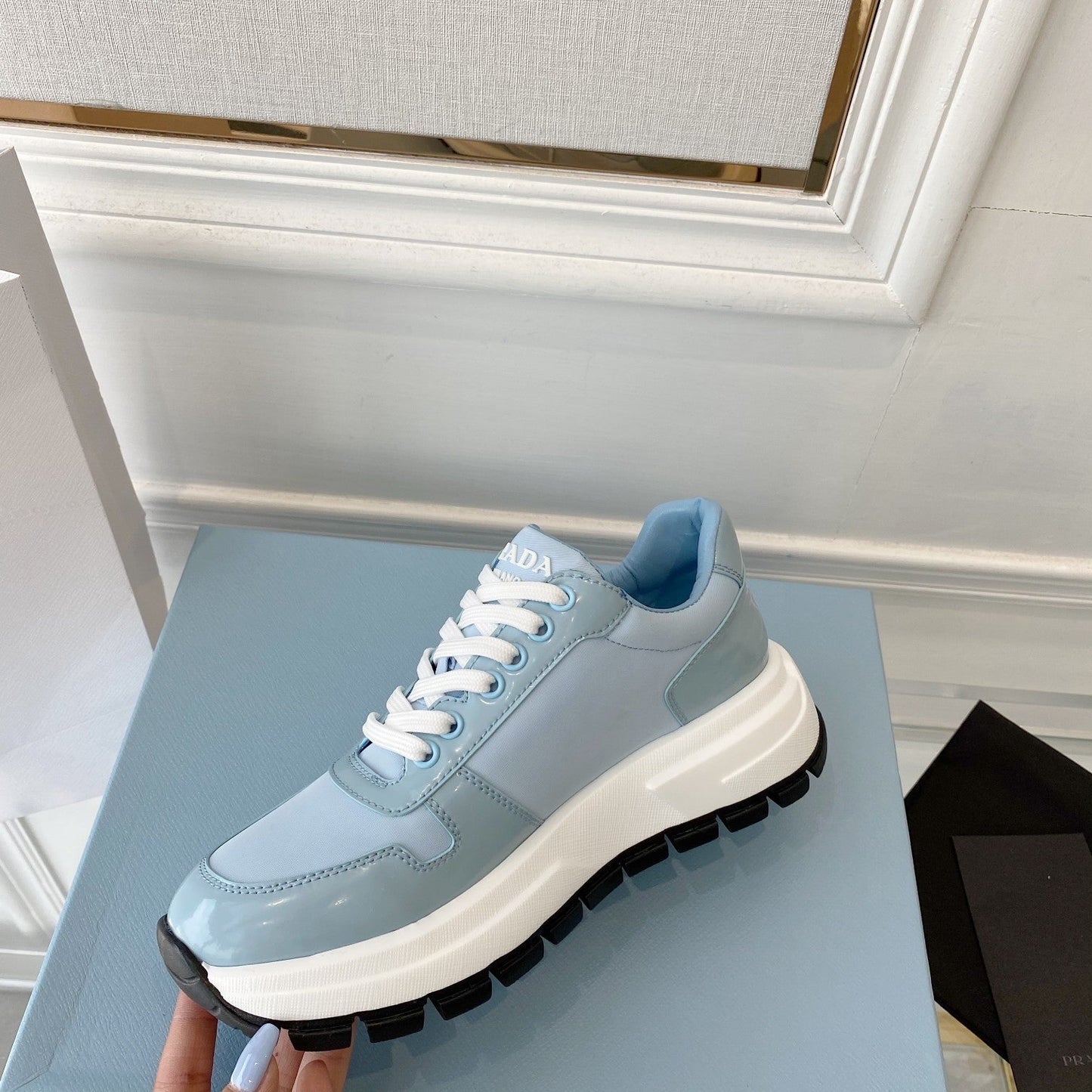 PRADA 25S THICK SOLE SNEAKER IN LIGHT BLUE CALFSKIN AND CANVAS - 34