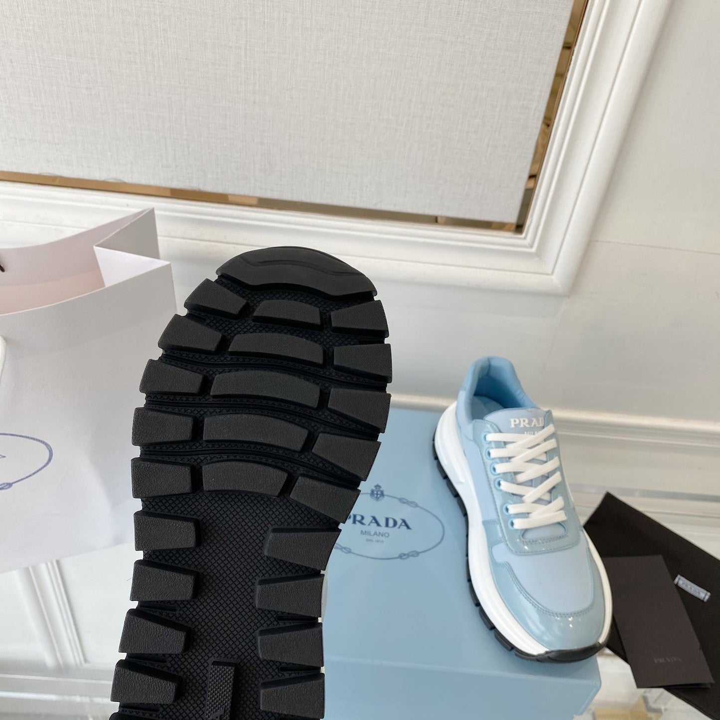 PRADA 25S THICK SOLE SNEAKER IN LIGHT BLUE CALFSKIN AND CANVAS - 34