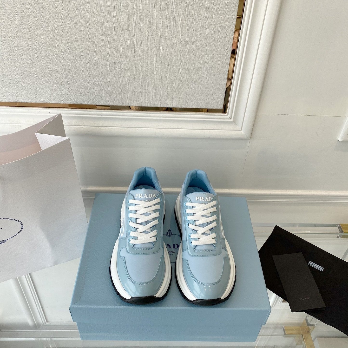PRADA 25S THICK SOLE SNEAKER IN LIGHT BLUE CALFSKIN AND CANVAS - 34