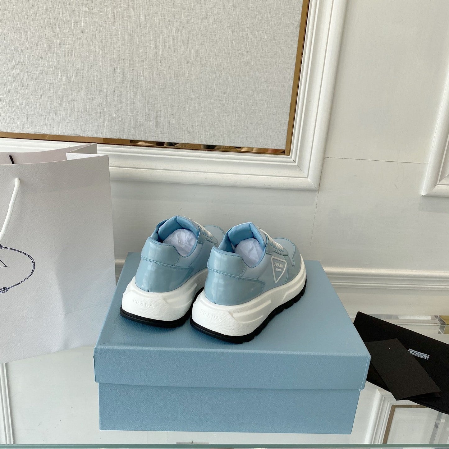 PRADA 25S THICK SOLE SNEAKER IN LIGHT BLUE CALFSKIN AND CANVAS - 34