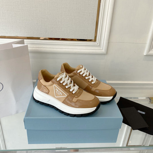 PRADA 25S THICK SOLE SNEAKER IN BROWN CALFSKIN AND CANVAS - 34