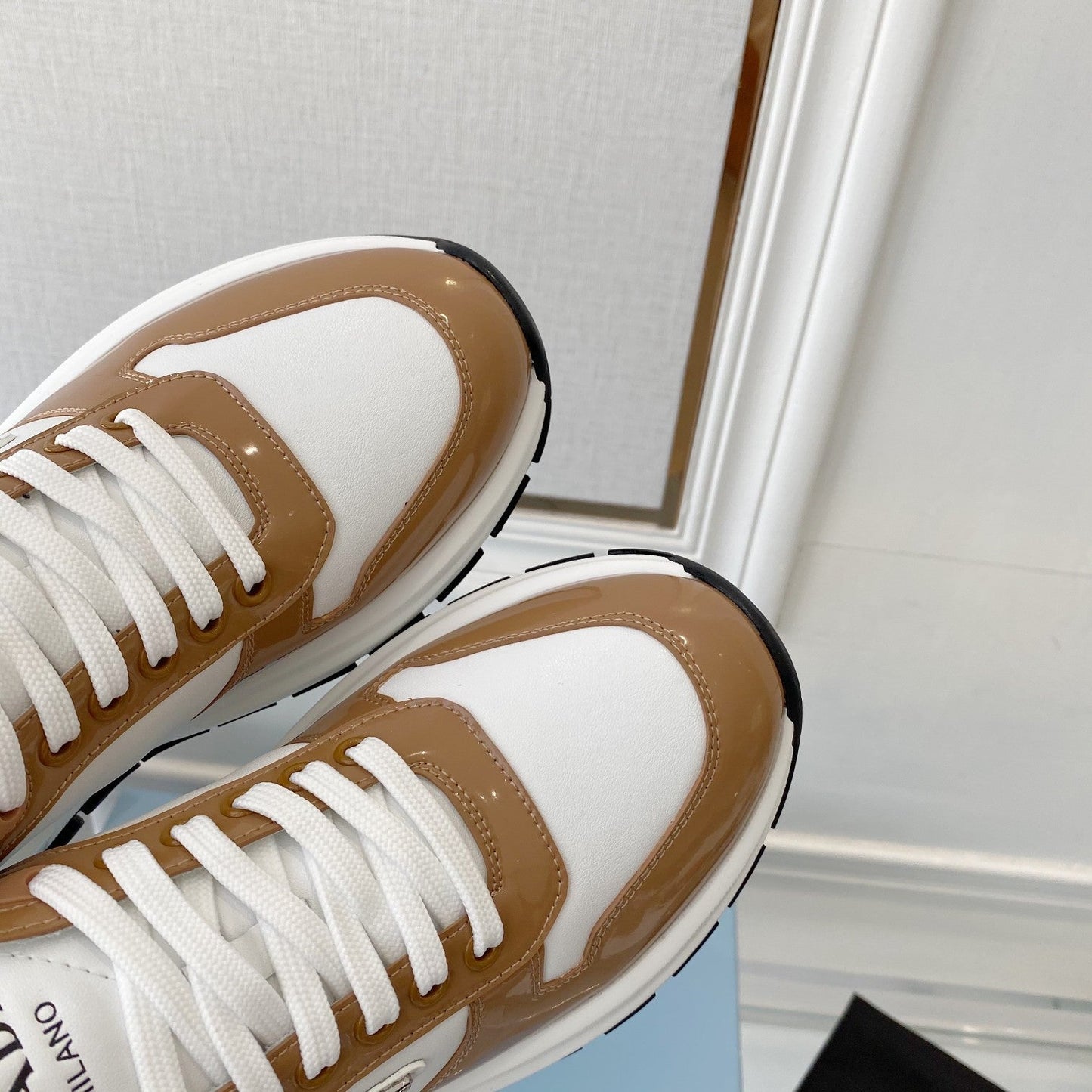 PRADA 25S THICK SOLE SNEAKER IN WHITE AND BROWN CALFSKIN - 34