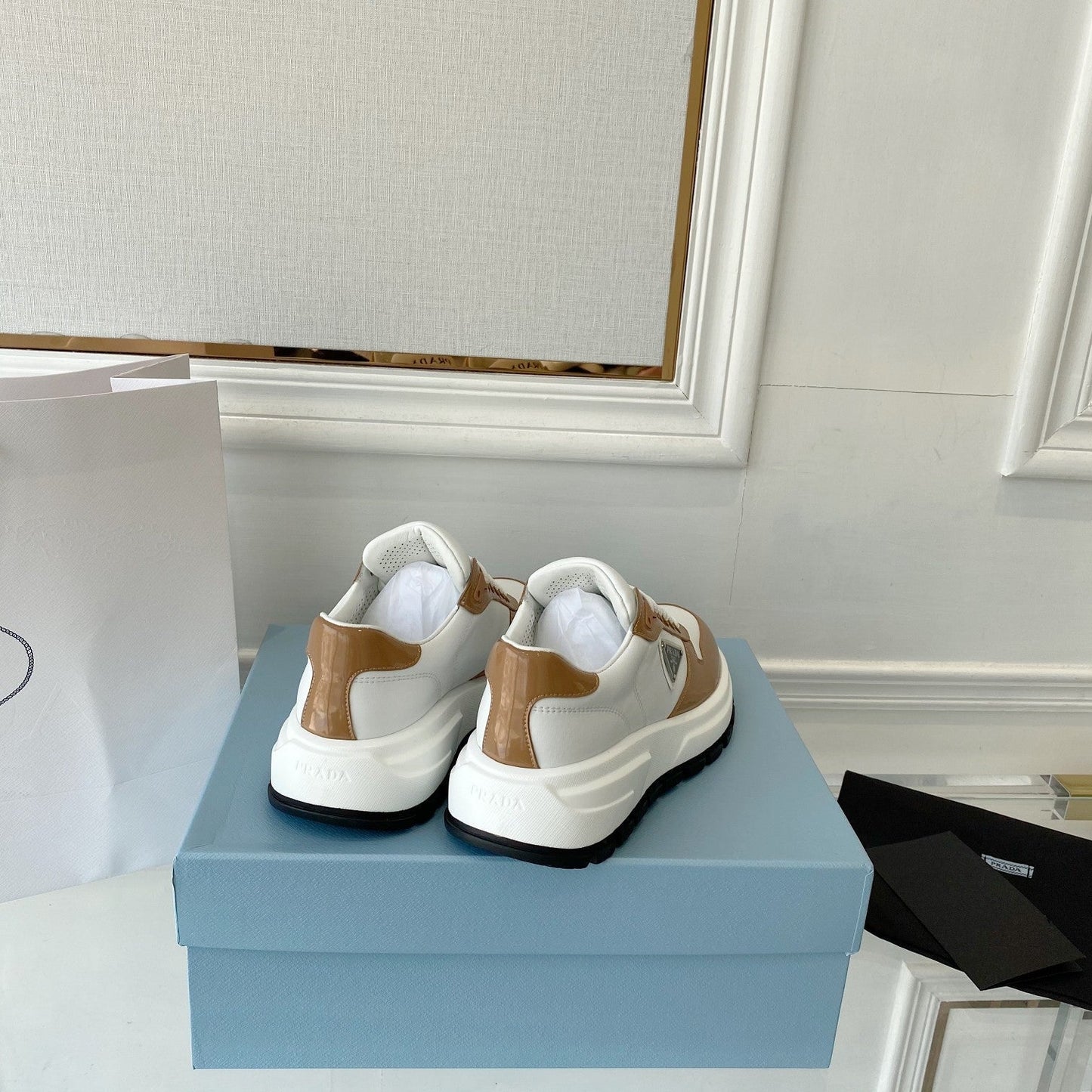 PRADA 25S THICK SOLE SNEAKER IN WHITE AND BROWN CALFSKIN - 34
