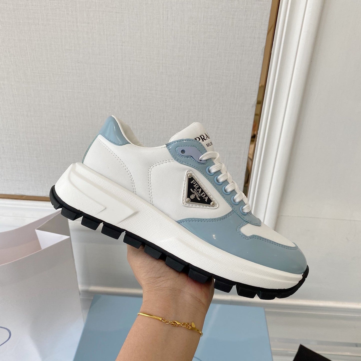 PRADA 25S THICK SOLE SNEAKER IN WHITE AND LIGHT BLUE CALFSKIN - 34