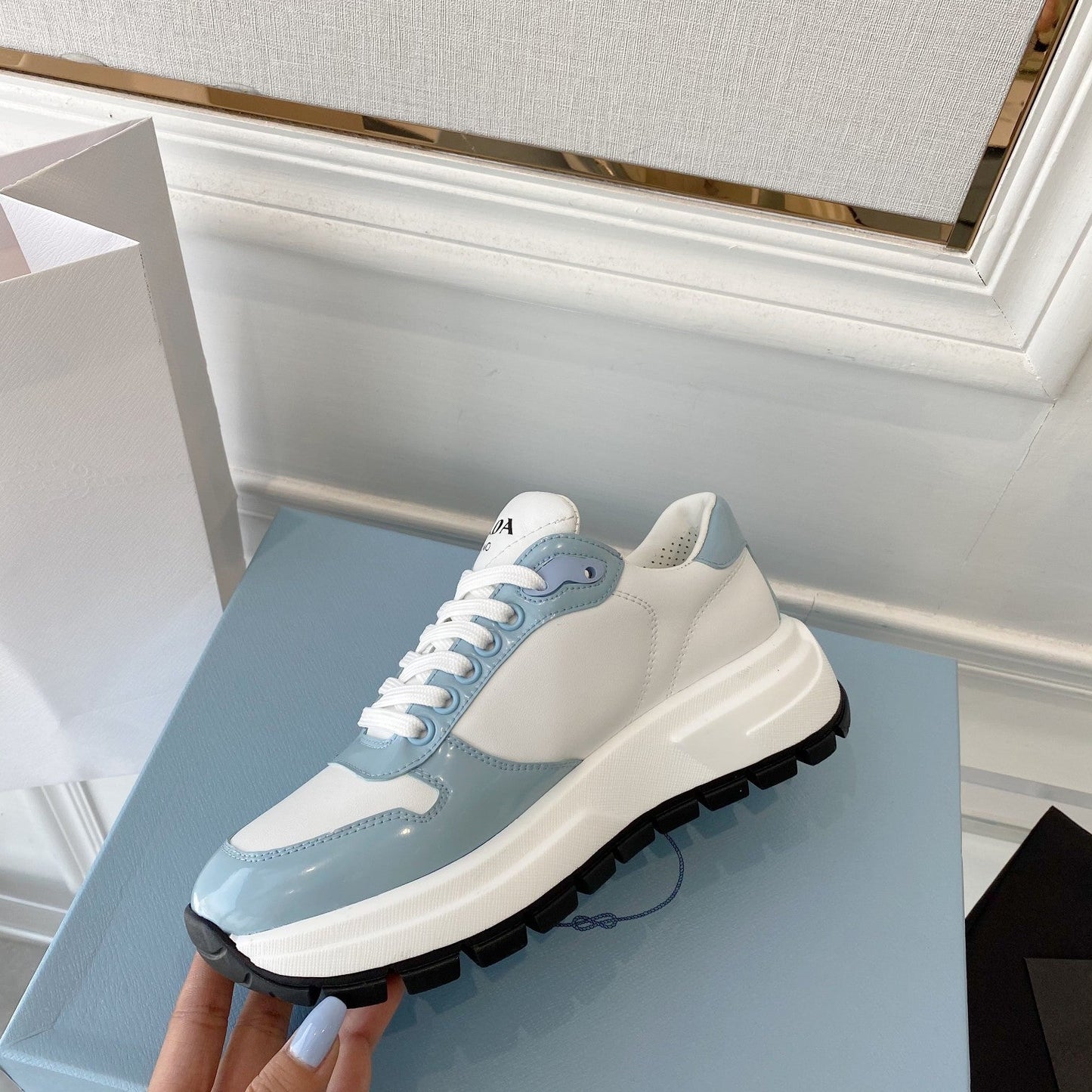 PRADA 25S THICK SOLE SNEAKER IN WHITE AND LIGHT BLUE CALFSKIN - 34