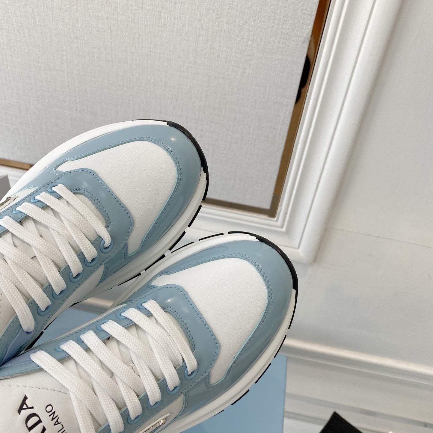 PRADA 25S THICK SOLE SNEAKER IN WHITE AND LIGHT BLUE CALFSKIN - 34