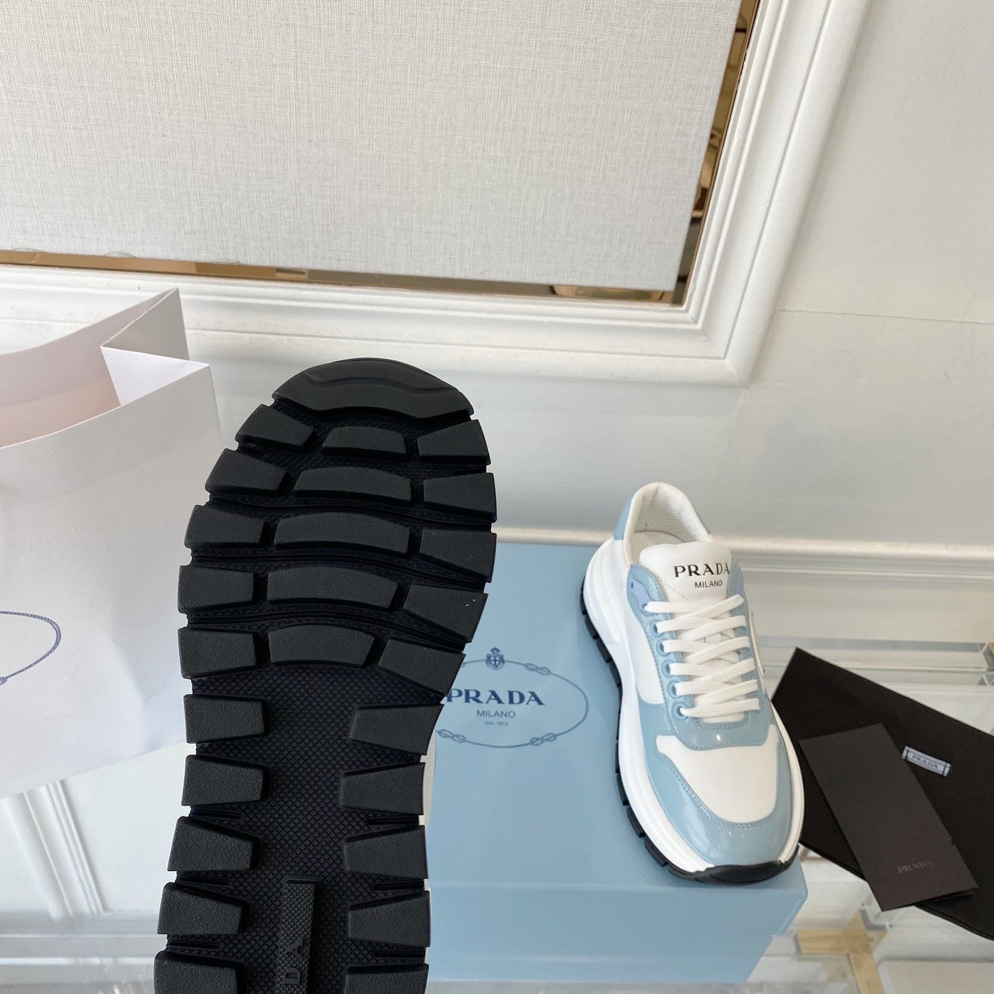 PRADA 25S THICK SOLE SNEAKER IN WHITE AND LIGHT BLUE CALFSKIN - 34