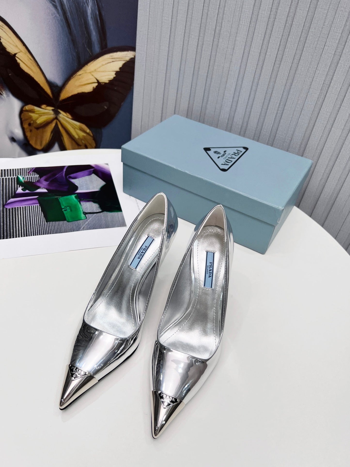 PRADA 26S ТУФЛІ-ЧОВНИКИ НА ШПИЛЬЦІ 95 ММ З ТЕЛЯЧОЇ ШКІРИ, З МЕТАЛЕВИМ НОСКОМ СРІБНОГО КОЛЬОРУ