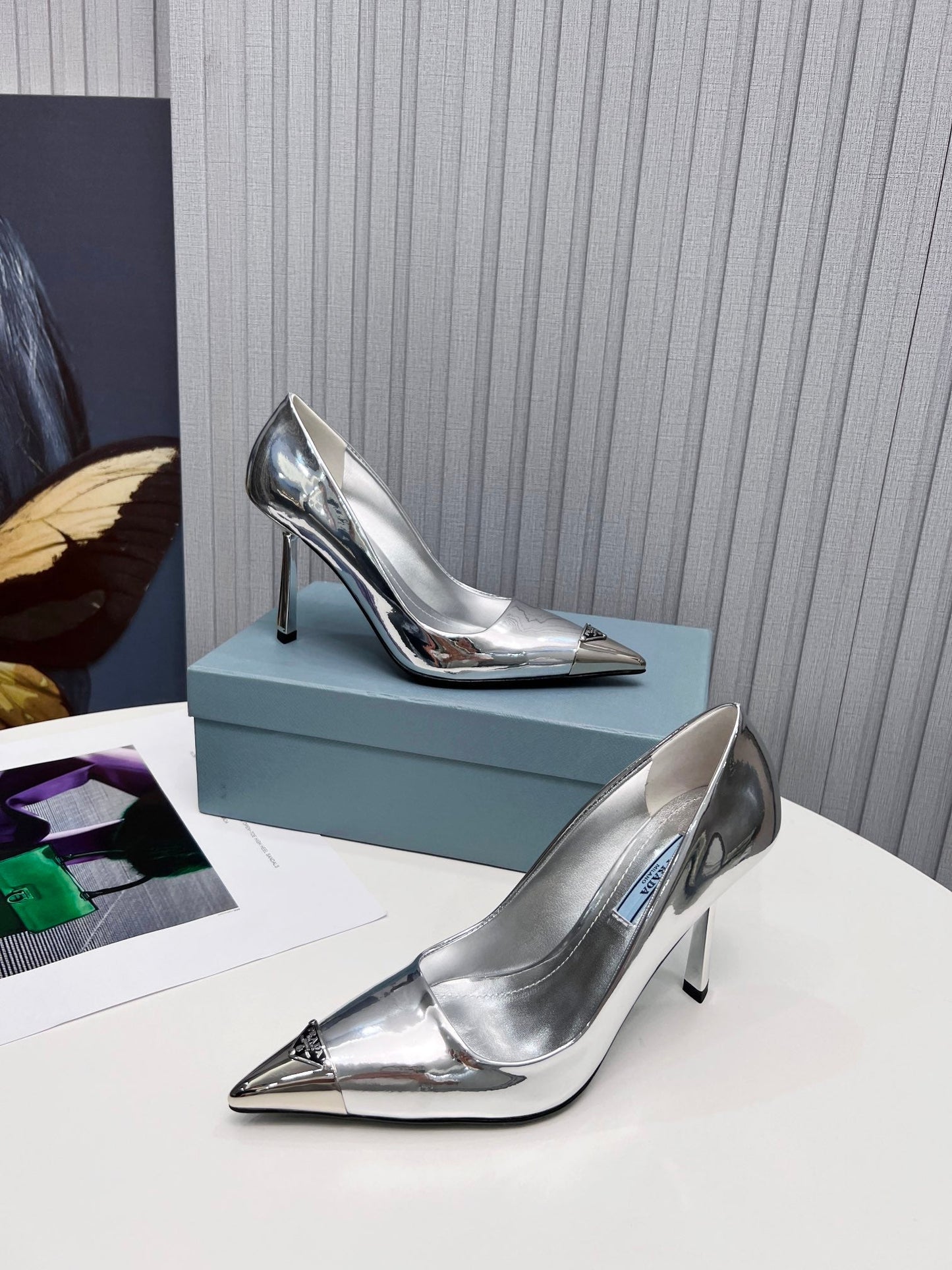 PRADA 26S ТУФЛІ-ЧОВНИКИ НА ШПИЛЬЦІ 95 ММ З ТЕЛЯЧОЇ ШКІРИ, З МЕТАЛЕВИМ НОСКОМ СРІБНОГО КОЛЬОРУ
