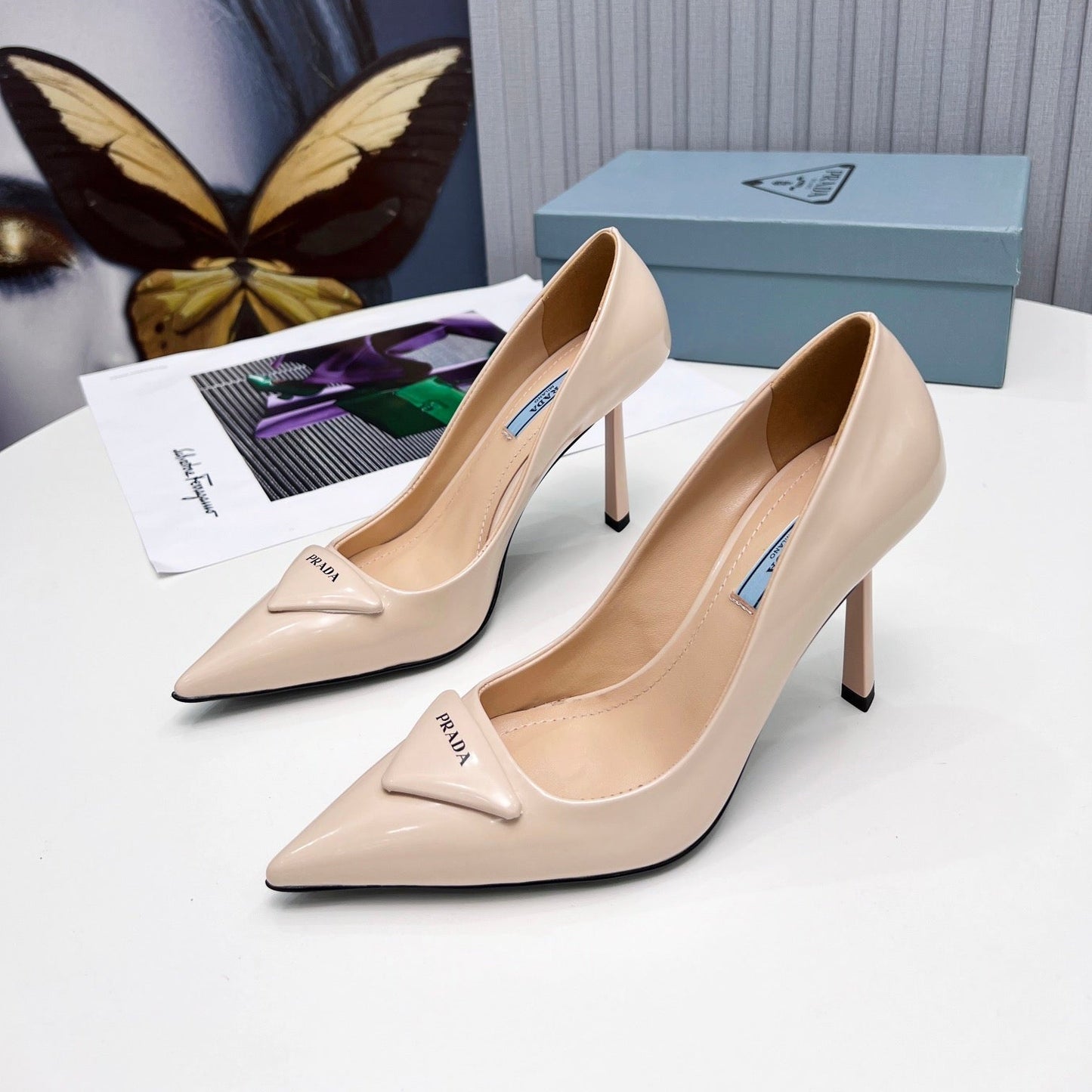 PRADA 26S POINTED TOE PUMPS STILETTO HEEL 95MM IN NUDE BEIGE PATENT CALFSKIN LOGO